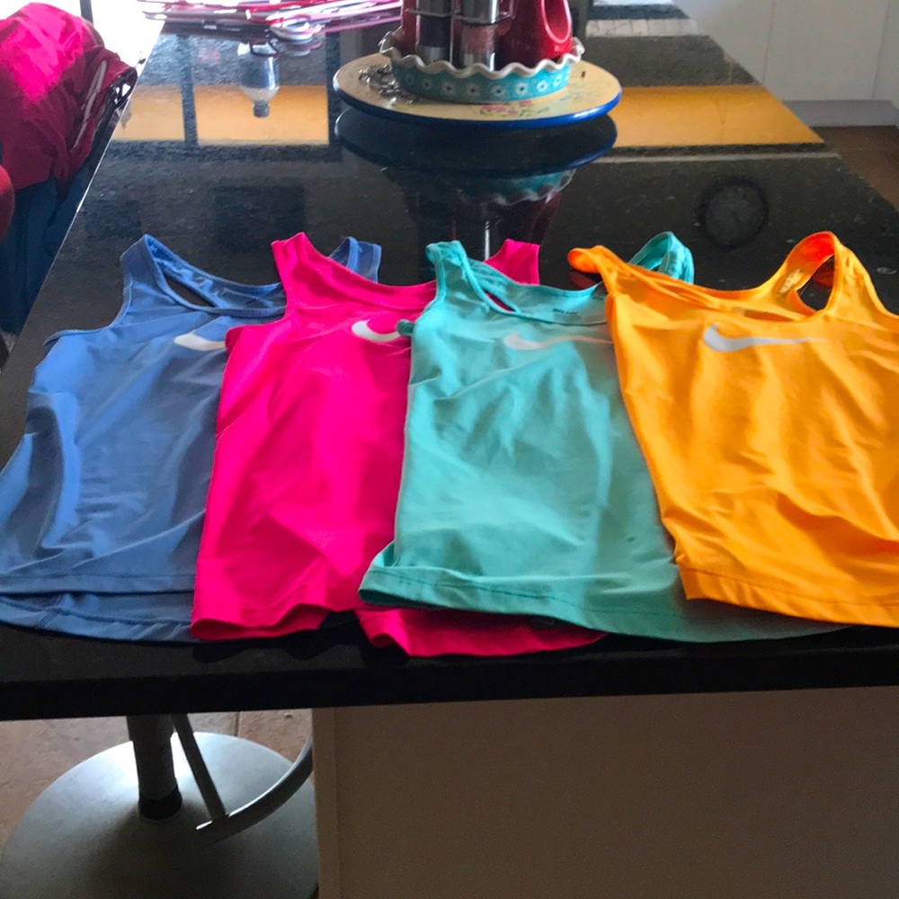 Bundle of four Nike tops